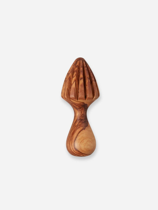 A wooden citrus juicer with a ribbed suction-style top and a curved handle, shown on a plain light gray background.