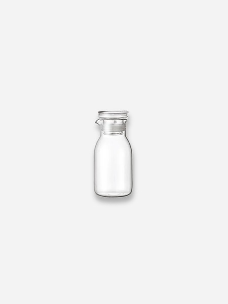 A metallic cylindrical sleeve or bushing with a smooth outer surface and a hollow center, shown on a plain white background.
