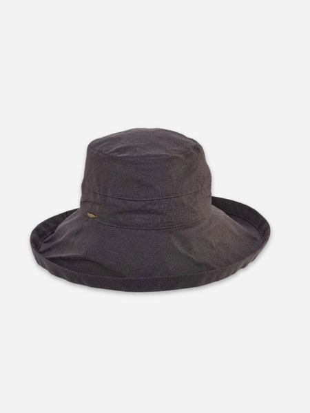 A dark charcoal gray wide-brimmed bucket hat with a small gold logo on the side, displayed against a light gray background.