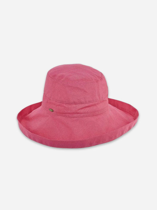 A pink wide-brimmed sun hat with a small green embroidered logo on the front, displayed against a light gray background.