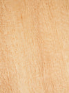 A close-up texture of light tan wood grain with natural wavy patterns and subtle darker brown lines.