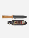 A fixed-blade knife with a light brown wooden handle and a dark gray steel blade, shown above its black sheath with a camouflage label, on a light gray background.
