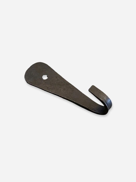 A rustic black metal hook with a flat, elongated head featuring a pre-drilled hole, shown on a light gray background.