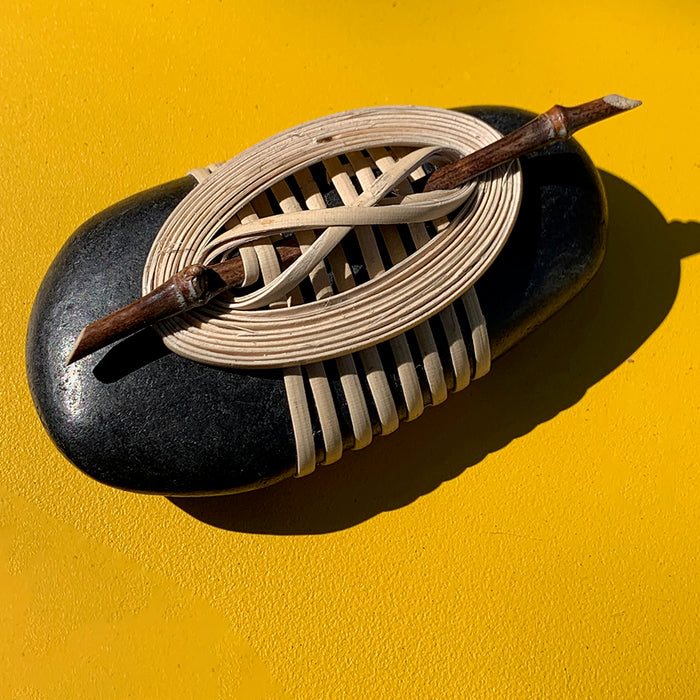 Home: Braided Rock with Stick
