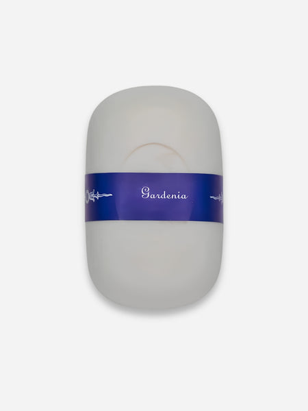 A white bar of soap with a vibrant blue band around its middle, featuring the name 'Gardenia' in white script.