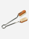 A pair of long-handled metal cleaning brushes with light brown wooden handles and cream-colored bristles, shown on a light gray background.