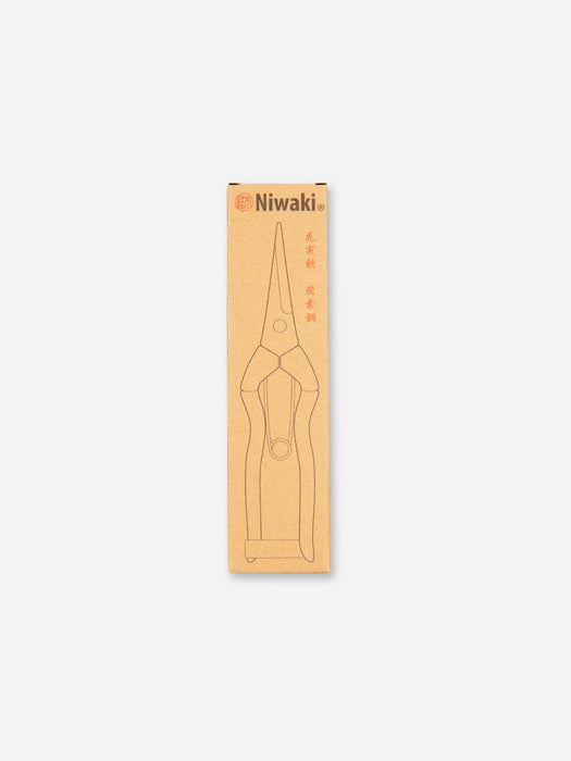 A tall, narrow kraft paper box with a line drawing of a pair of pliers and the brand name Niwaki printed at the top, shown on a plain white background.